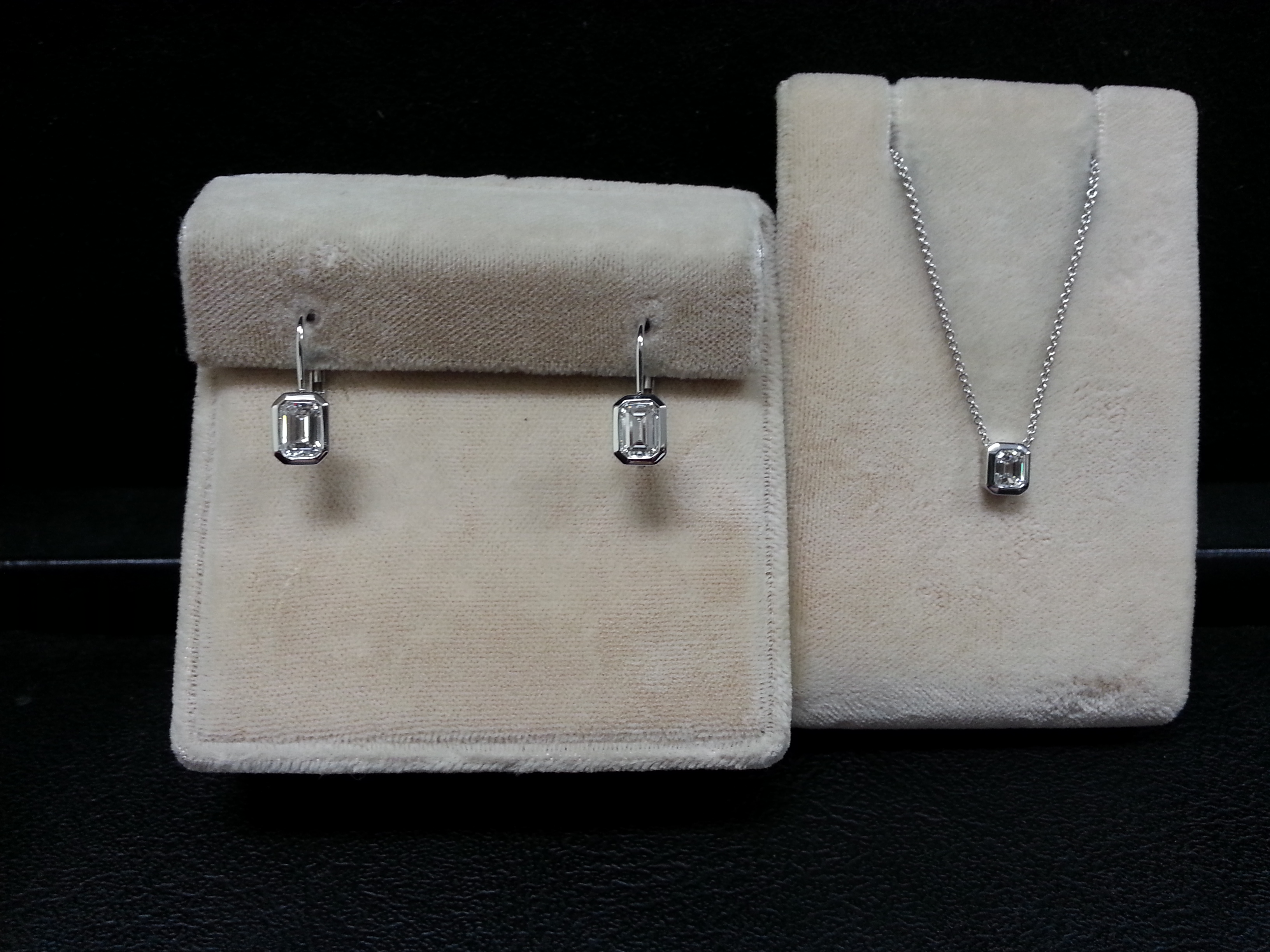 18k White Gold Bezel Set Emerald Cut Diamond Earrings. F/VS-SI D1.15ctw.