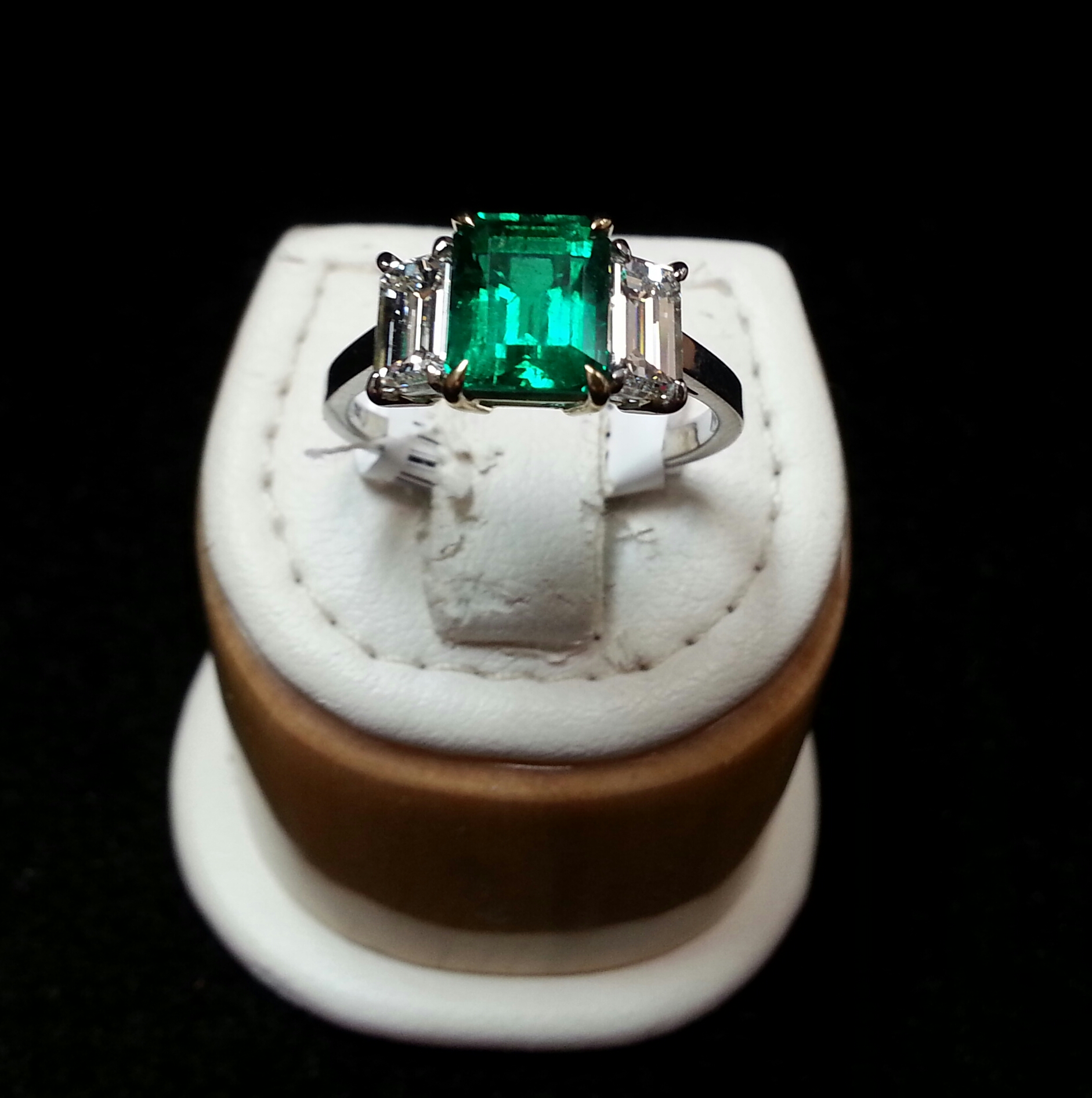 Platinum & 18k Yellow Gold Handmade Ring With an Emerald Cut Emerald & Emerald Cut Diamonds. Emerald is 1.64ct and Diamonds are 1.05ctw F/VS1
